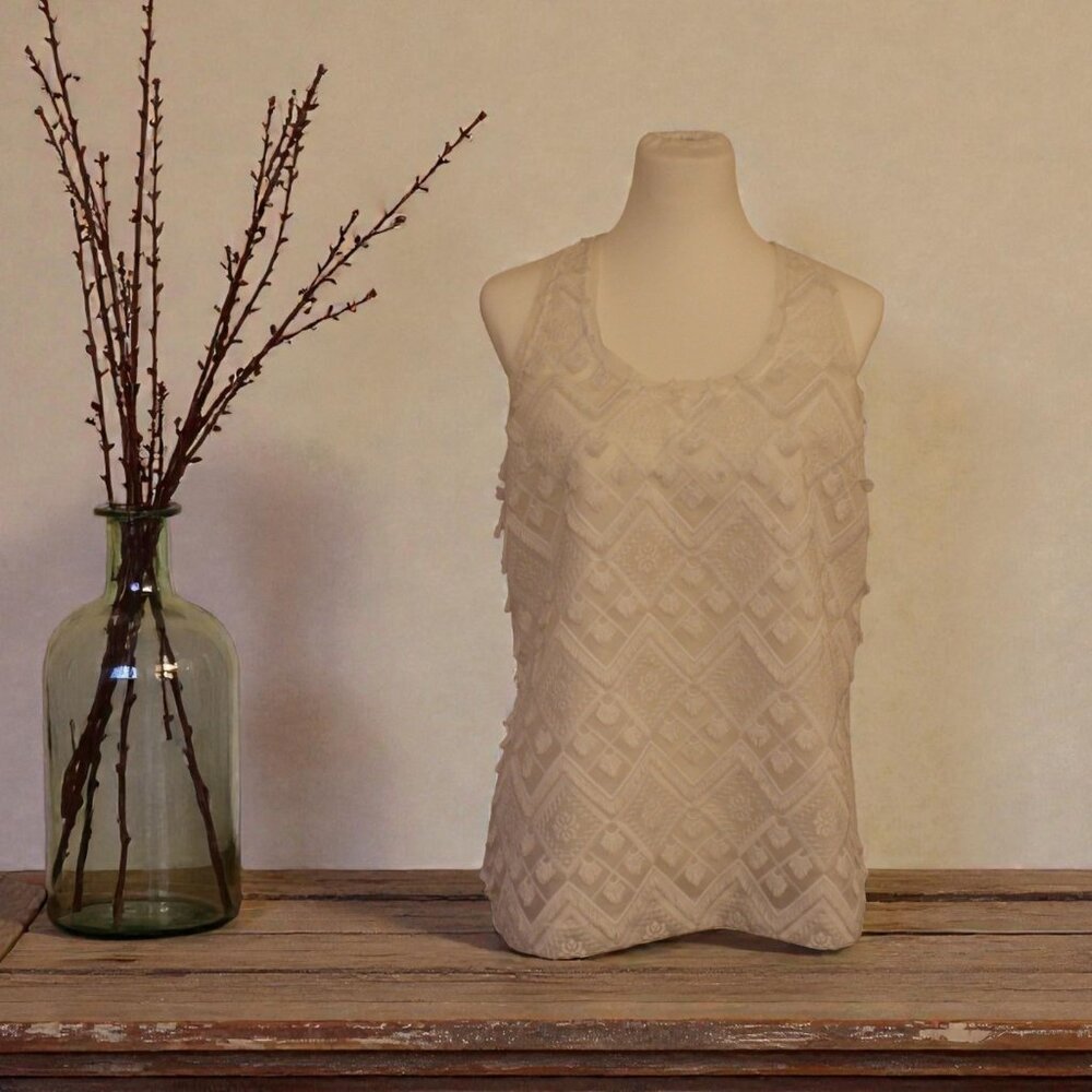 Banana Republic chic white tank with unique detailing.